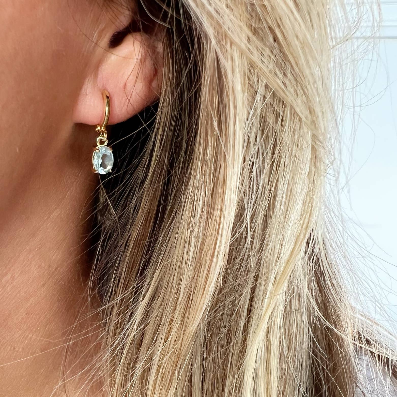 Laguna Blue CZ Huggie Hoops Earrings